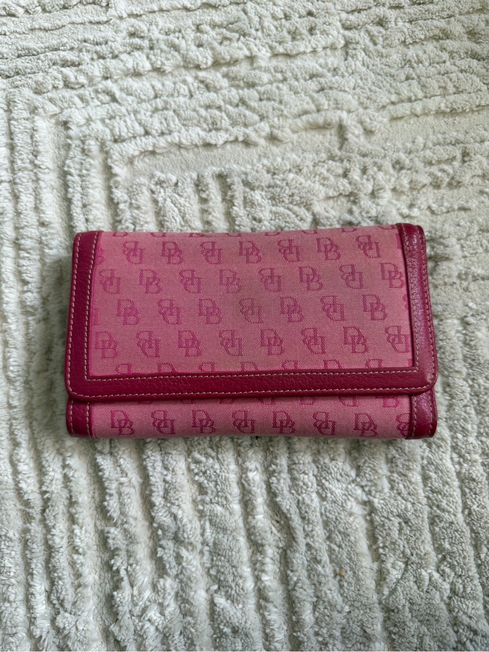 Vintage Dooney & Bourke pink monogram canvas and leather trifold wallet